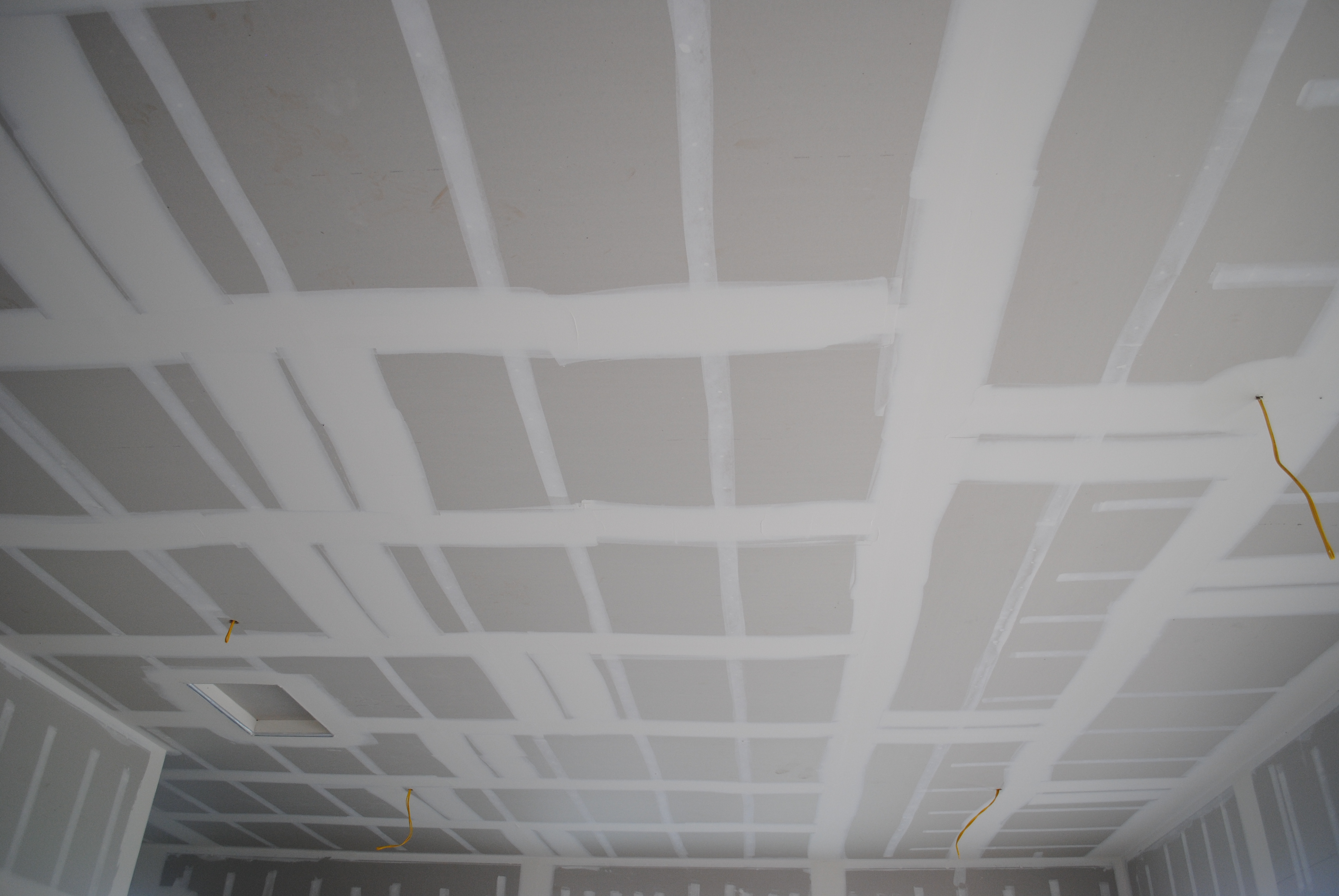 Drywall ceiling grid taping