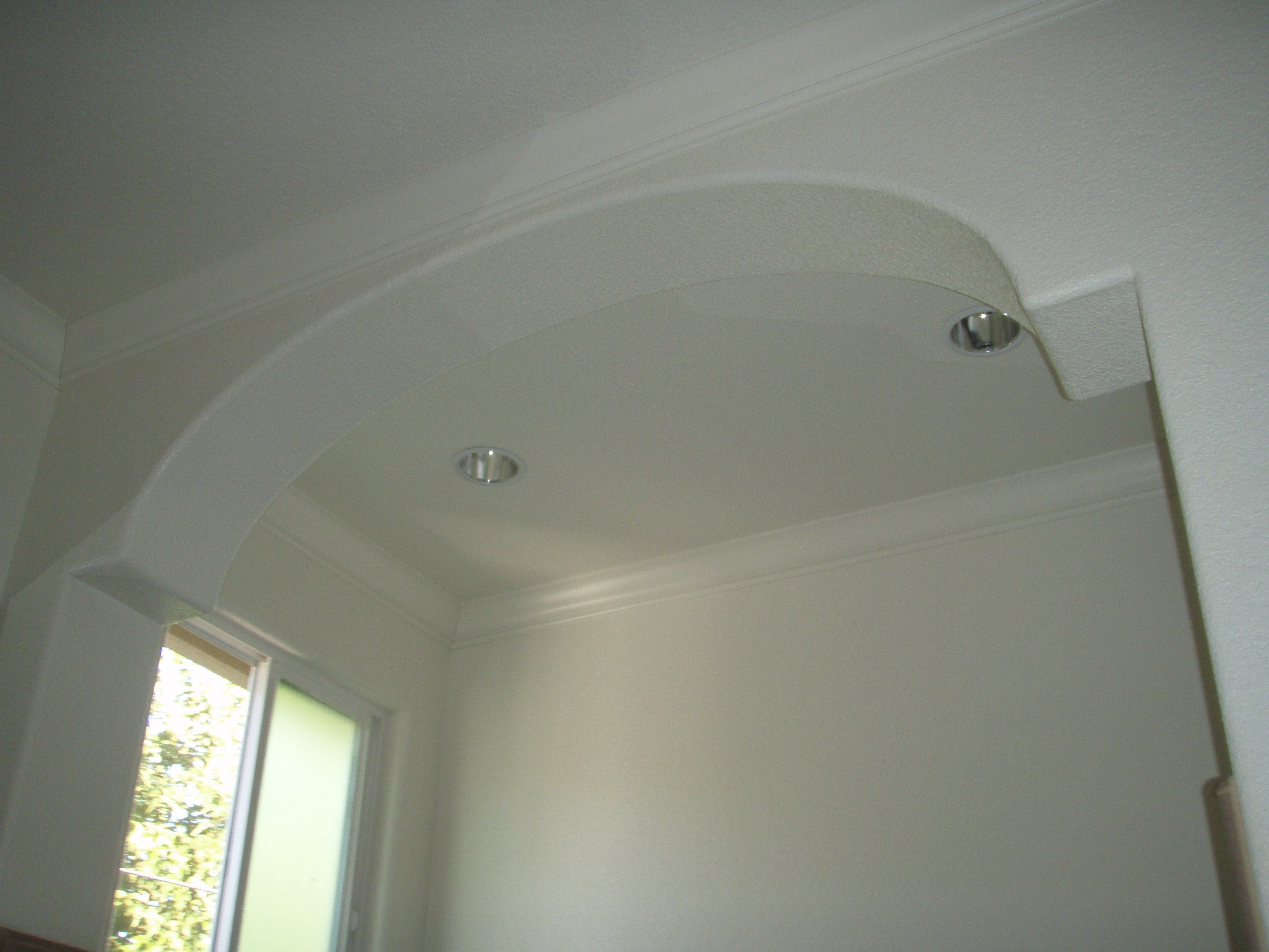 Finished arch window trim