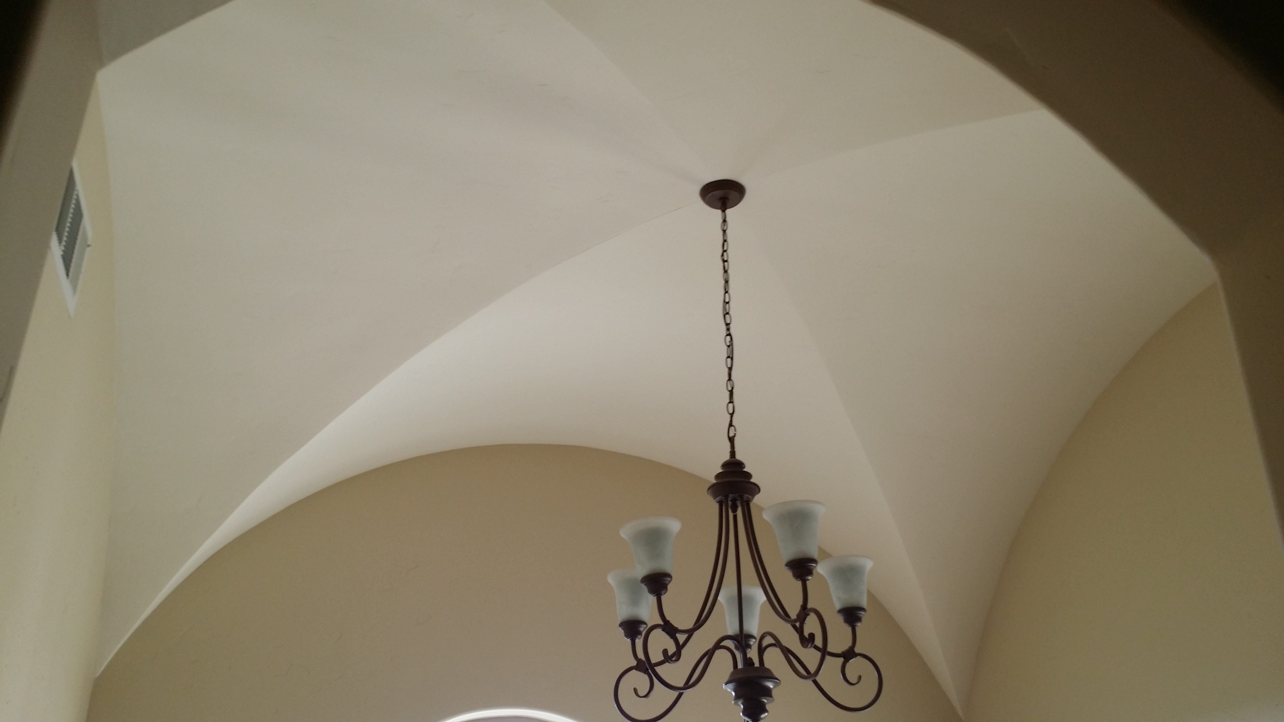 Vaulted ceiling chandelier arch