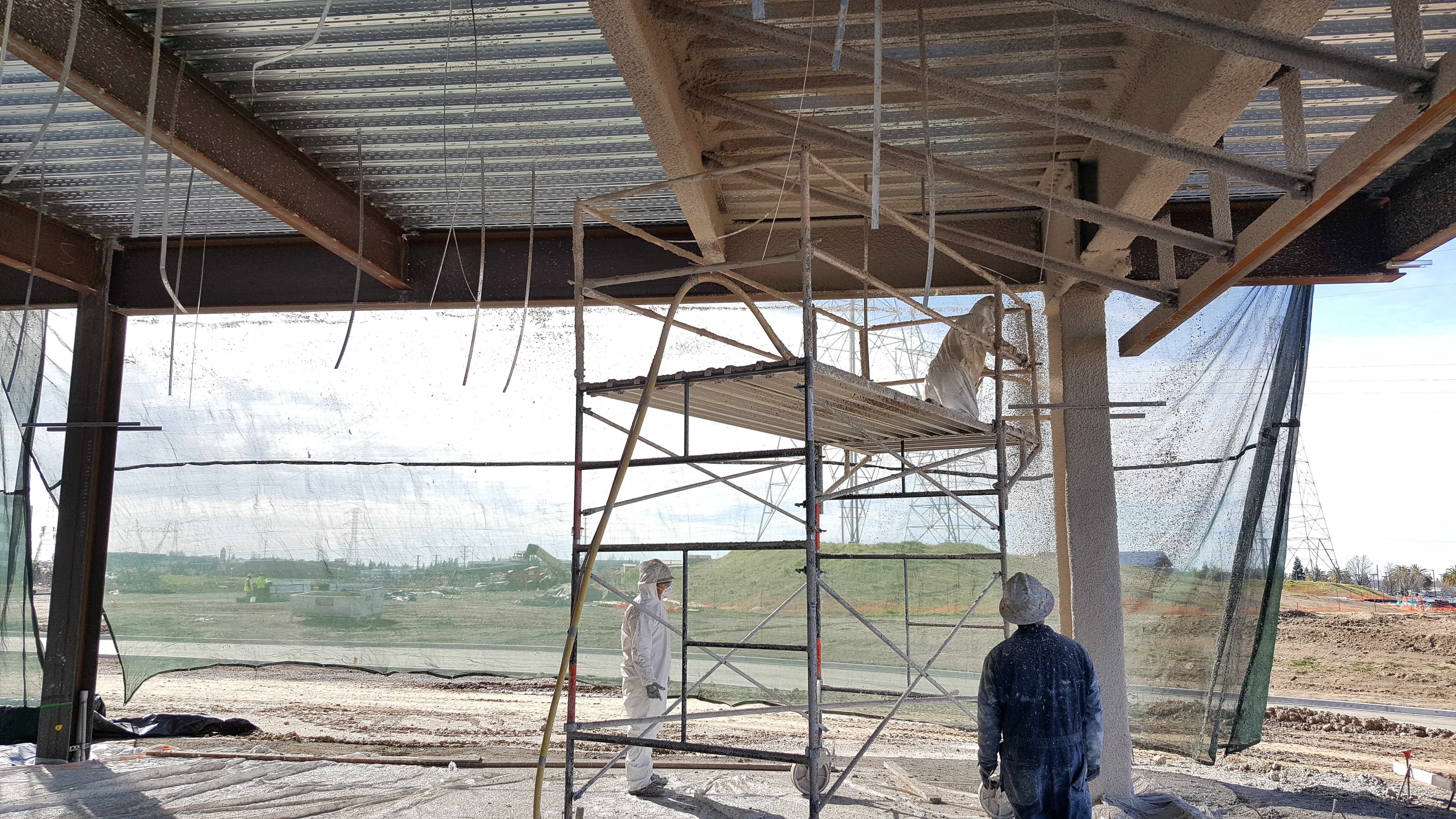 Scaffolded fireproofing work area