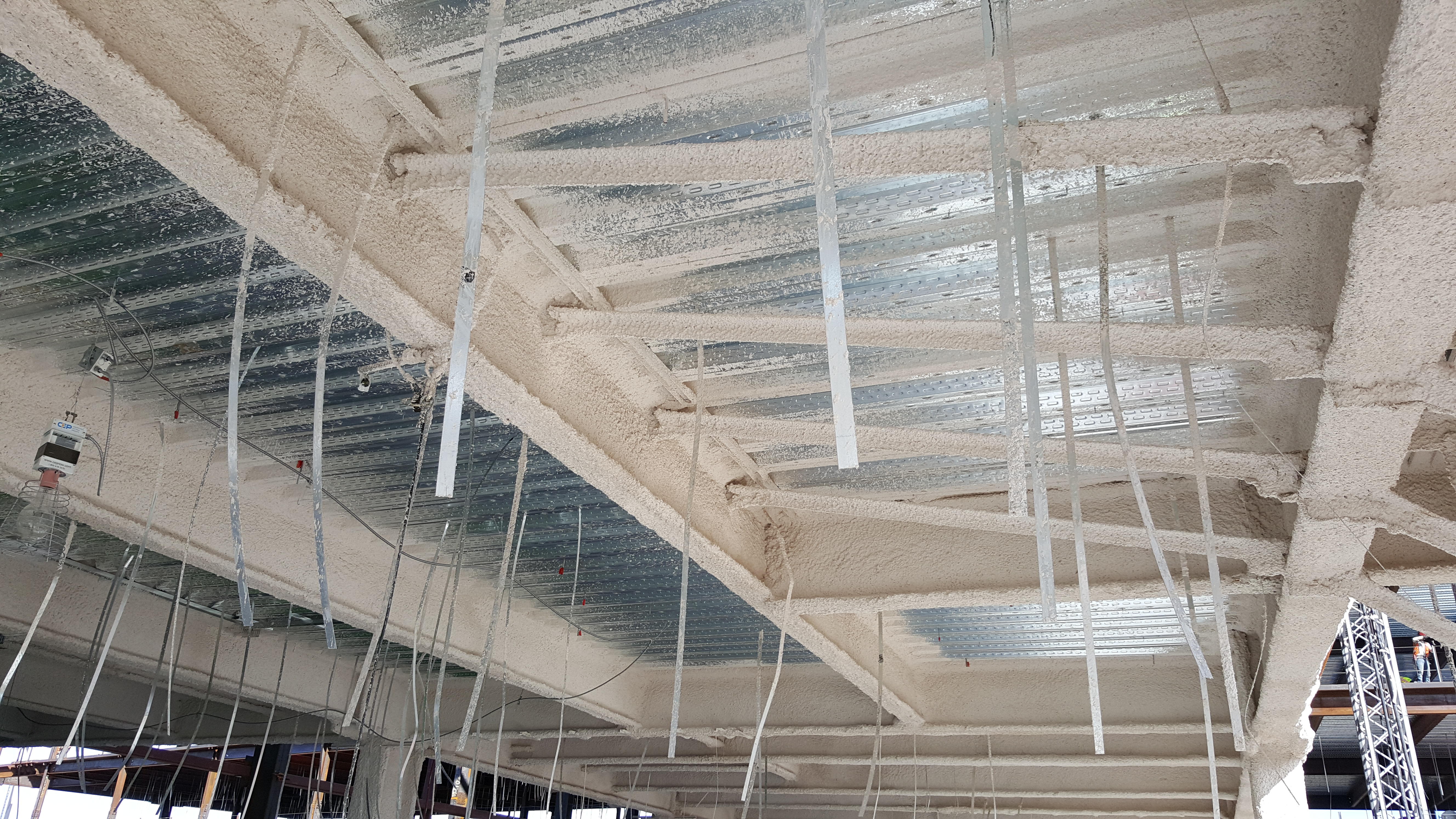 Spray applied fireproofing decking
