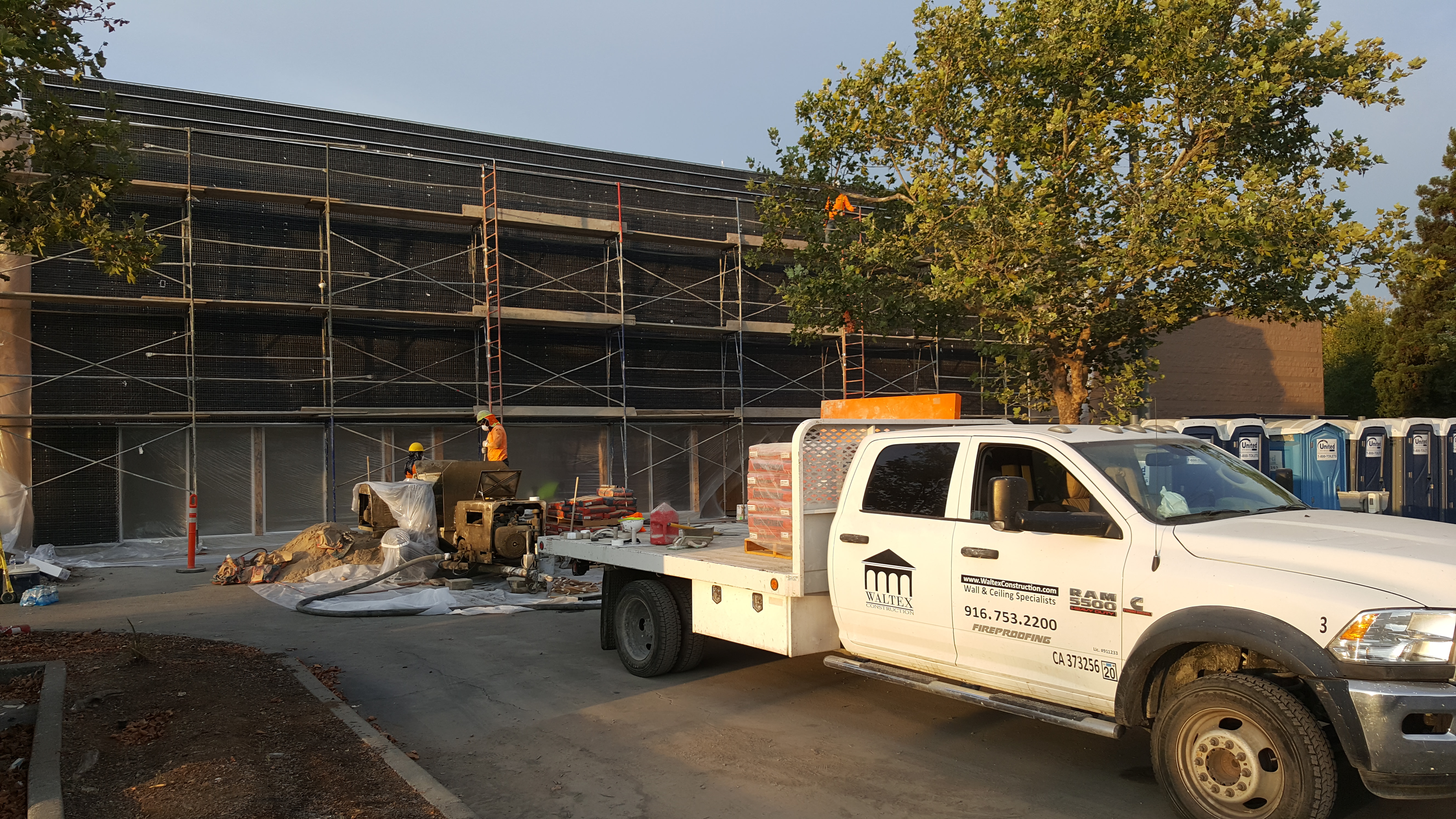 Scaffold truck stucco worksite